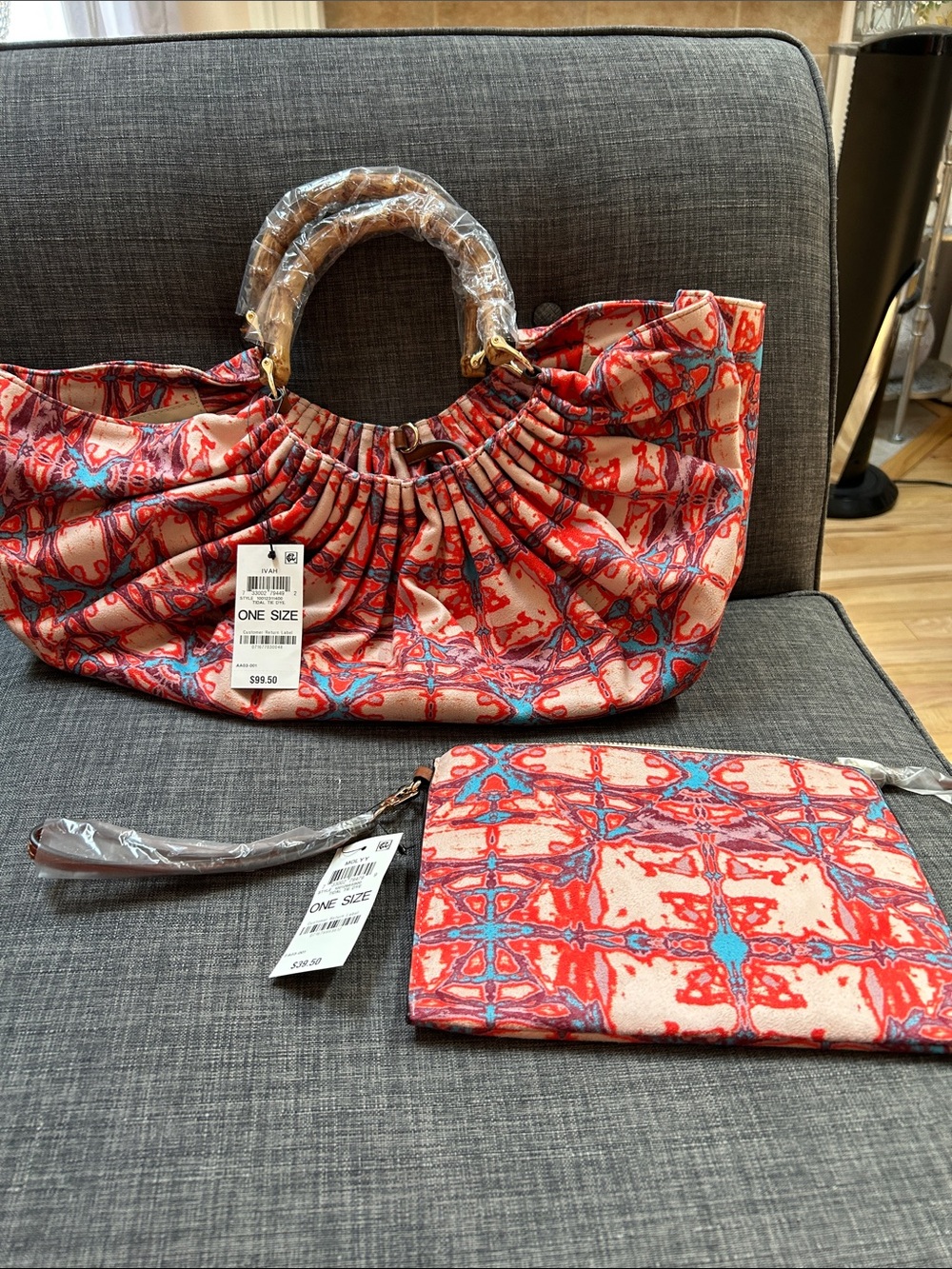 INC International tie dye patterned Handbag with coordinating wristlet.